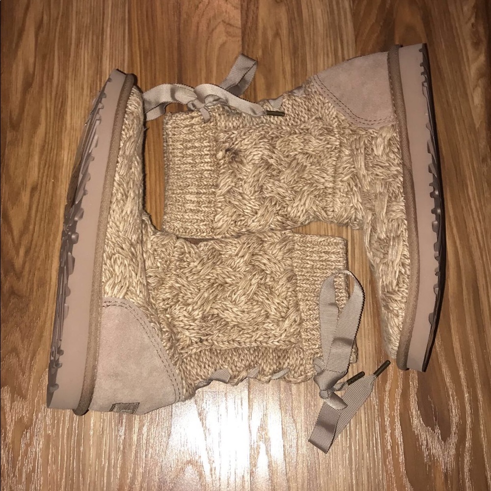 Brand new UGG boots with bow tie on back. Knit